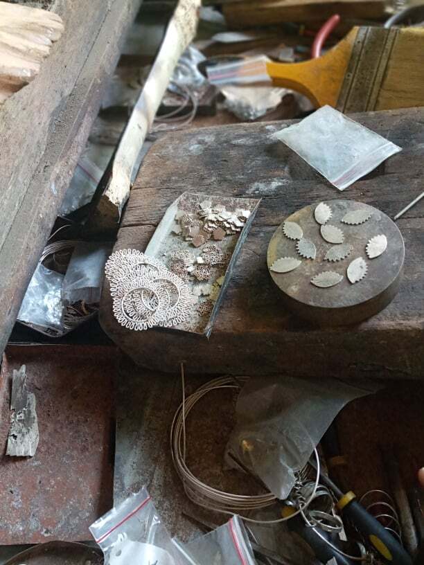 Banaba Flower Creolla Earrings, process shot, pieces prior to assemble